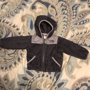 Infant The North Face fleece jacket.